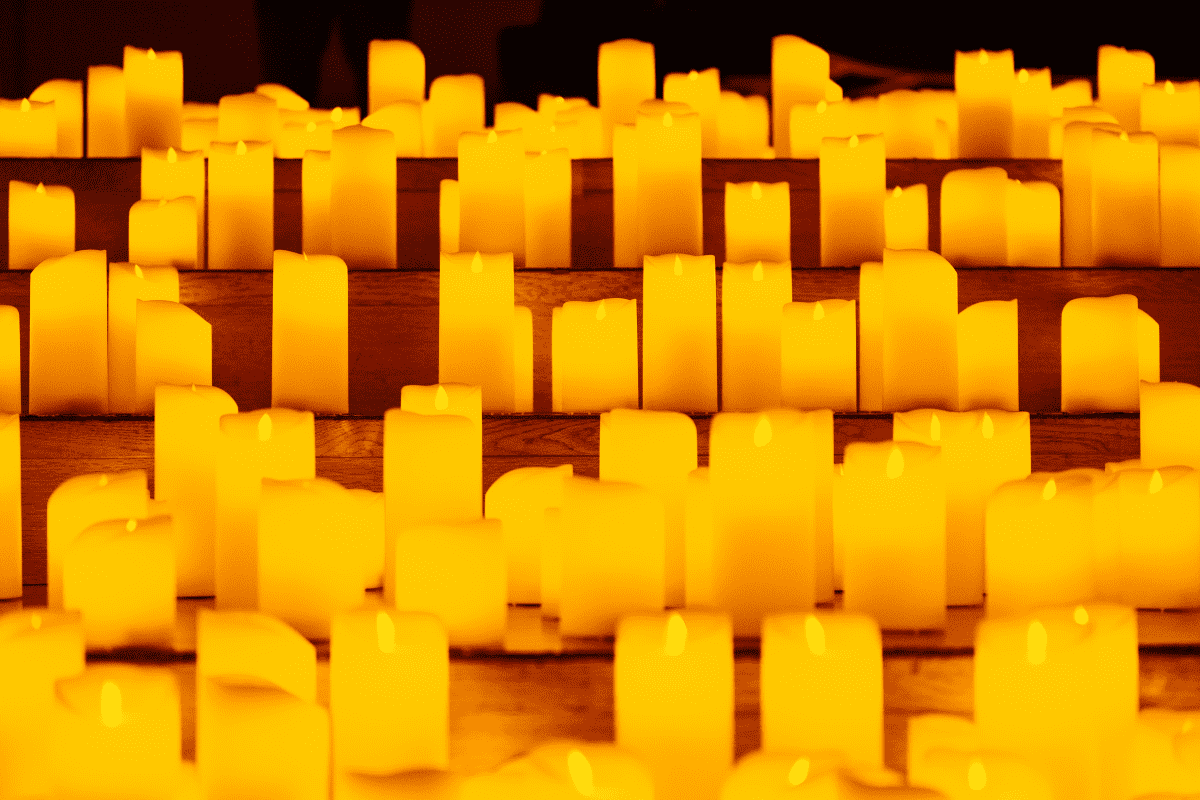 A close-up of candles on display on stairs at a Candlelight concert.